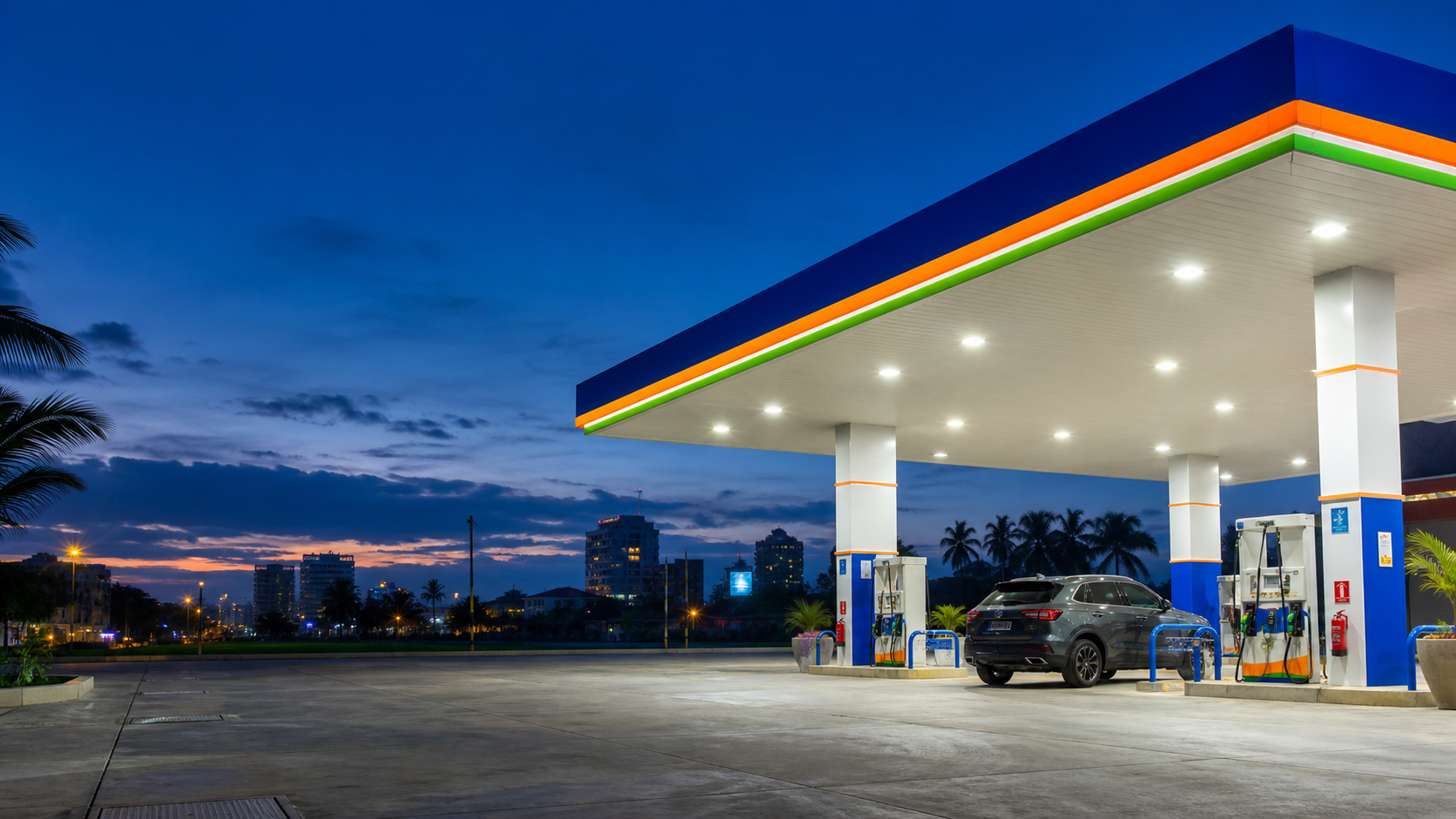 A modern Rupeez petrol station at dusk